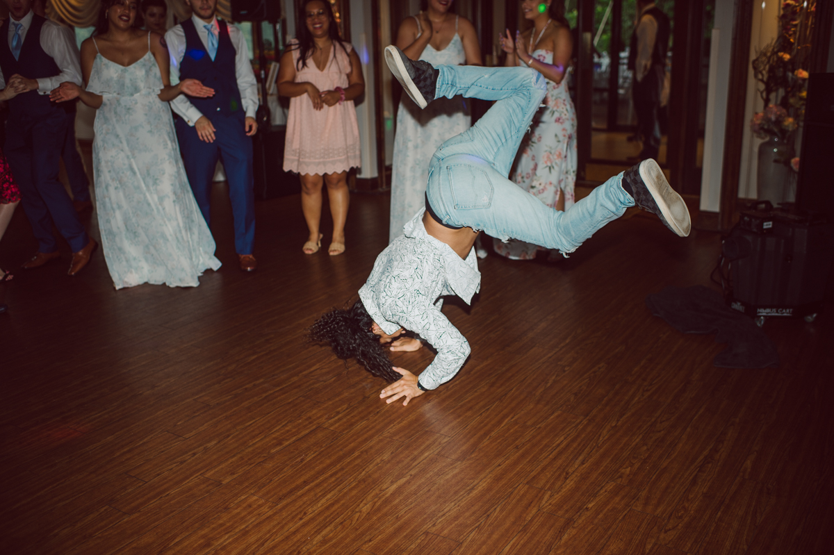These two dancers, passionate lovers got married on a hot humid day at Auletto Caterers in Deptford NJ. Even though it was hot & humid Nina and Hector were all smiles as well as their family during the family portrait time. Wedding couple's and families that listens to you and does everything you ask them to even though the weather and environment can be tough are the BEST kind of clients! Nina and Hector were that best ideal clients, they from day one left all control regarding photo to me, did not question or have concerns. Knowing that you have this full trust and control on the wedding day makes you want to give your 100% and more. Nina and Hector are one of my top ideal clients and their wedding day photos are living proof of it. Nina and Hector's wedding day was combined of casual, mess, chaos, laughters, chill, emotional and passionate love for dancing. This was my first time at Auletto Caterers and in this part of NJ and this wedding venue in Deptford NJ was a pleasant surprise. It was full of secret locations for photos, garden, little pond where I played around with reflections, peacocks, waterfall and lavender field! Plus kind people to work with. Nina and Hector's July wedding at Auletto Caterers NJ captured by Karis from Hey Karis NY, NJ, Brooklyn, Hudson Valley and Catskills Wedding and Elopement Photographer.